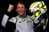 GP MALESIA, Jenson Button of Brawn GP celebrates taking pole position.